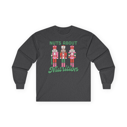 Charcoal long-sleeve shirt with nutcracker design and text 'Nuts About Nutrition' on a white background