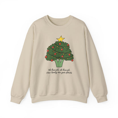 Sand colored sweatshirt with a broccoli Christmas tree design on a white background