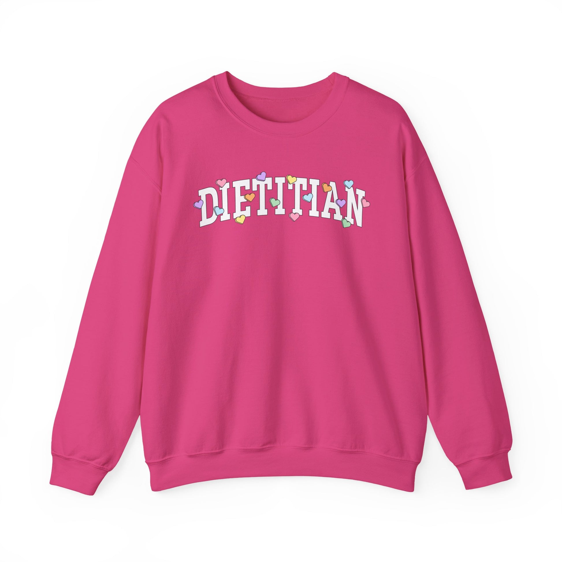 Deep pink sweatshirt with arched "DIETITIAN" text in white with multi-colored heart shaped Valentine candy sprinkled throughout the letters.