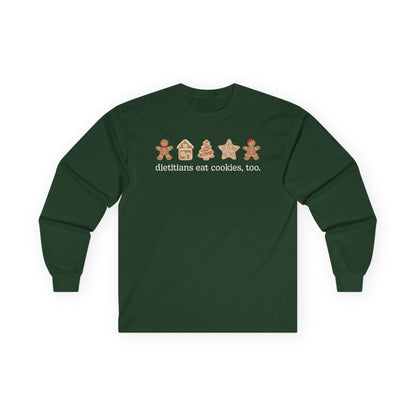 Green long-sleeve shirt with Christmas cookies design and text 'dietitians eat cookies, too' on a white background