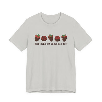 Light gray tshirt with chocolate covered strawberries and truffles with the text "diet techs eat chocolate, too."