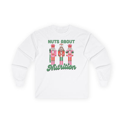 White long sleeve tshirt with nutcracker design and 'Nuts About Nutrition' text on a white background