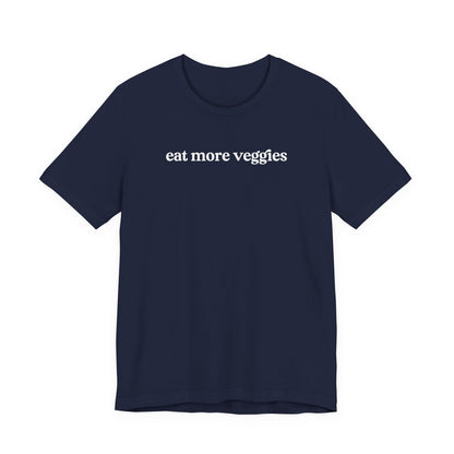 Navy blue t-shirt with 'eat more veggies' text on a white background