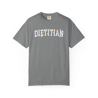 Gray tshirt with arched text "DIETITIAN" with multi-colored Valentine heart candy sprinkled throughout the letters