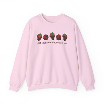 Pink sweatshirt with chocolate covered strawberries and truffles with the text "diet techs eat chocolate, too.