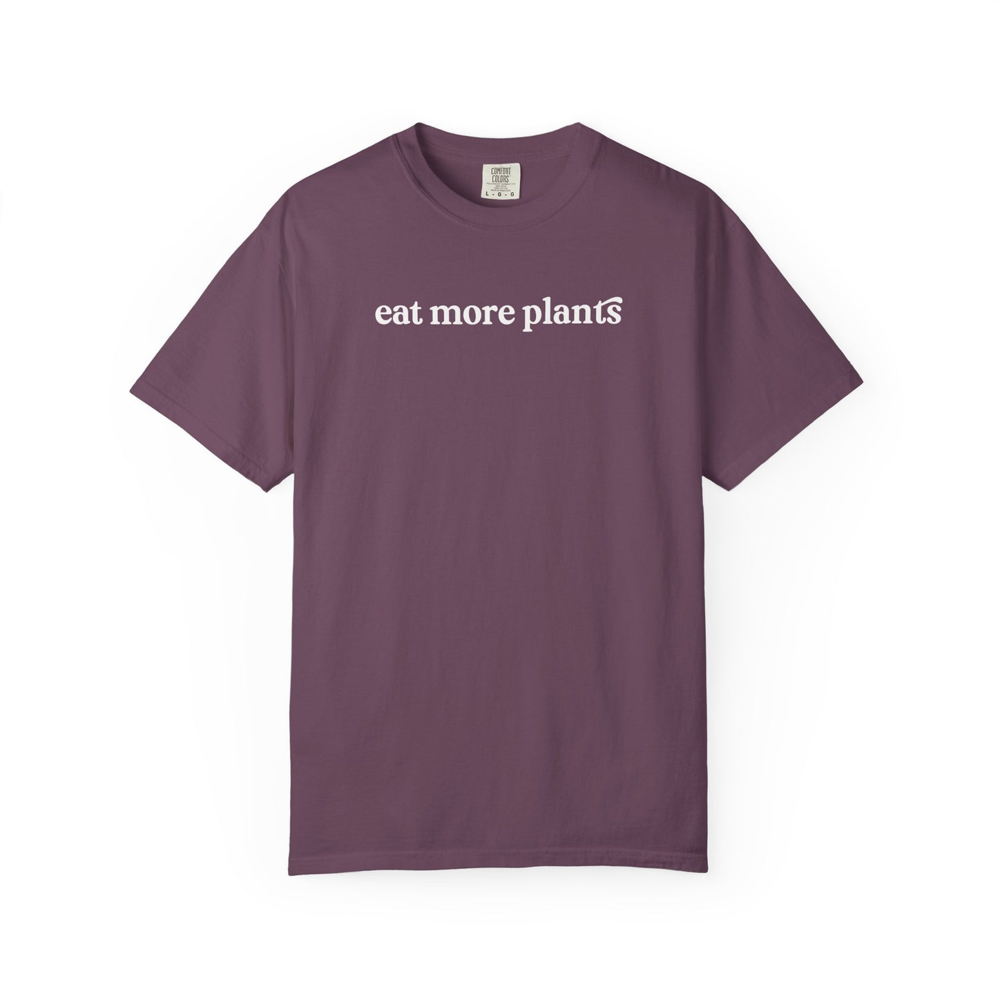 Purple t-shirt with 'eat more plants' text on a white background