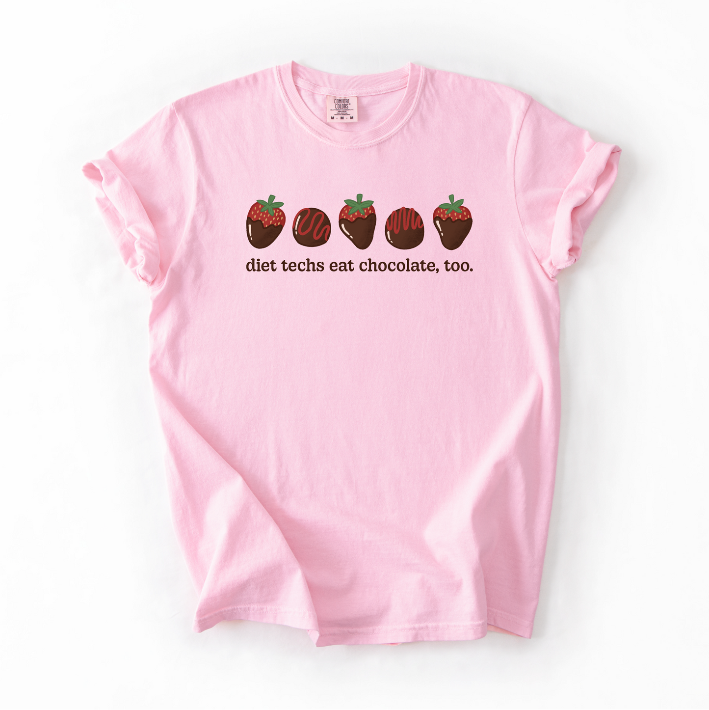 Pink tshirt with chocolate covered strawberries and truffles with the text "diet techs eat chocolate, too."