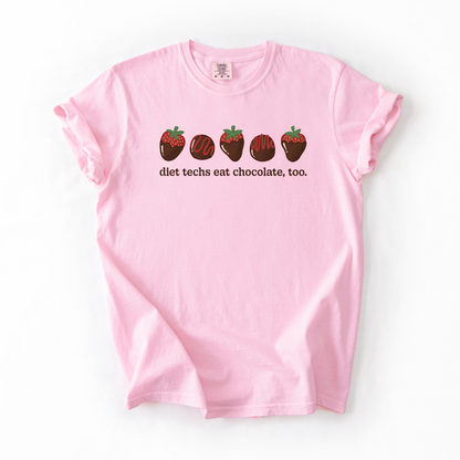 Pink tshirt with chocolate covered strawberries and truffles with the text "diet techs eat chocolate, too."