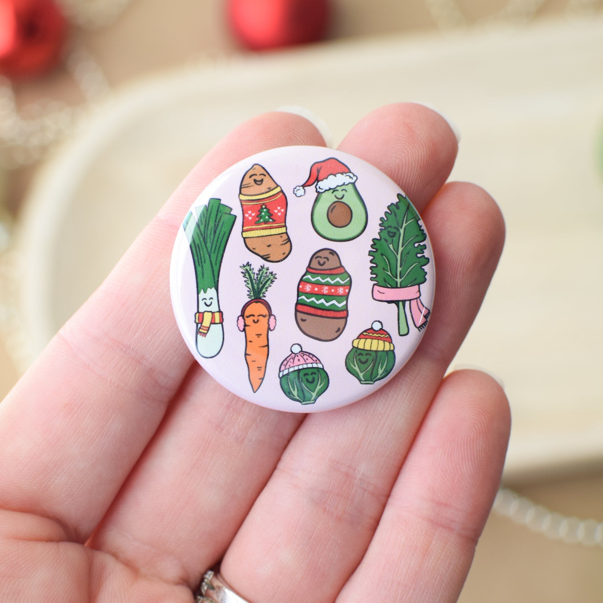 Circular badge with cartoon vegetables on a hand