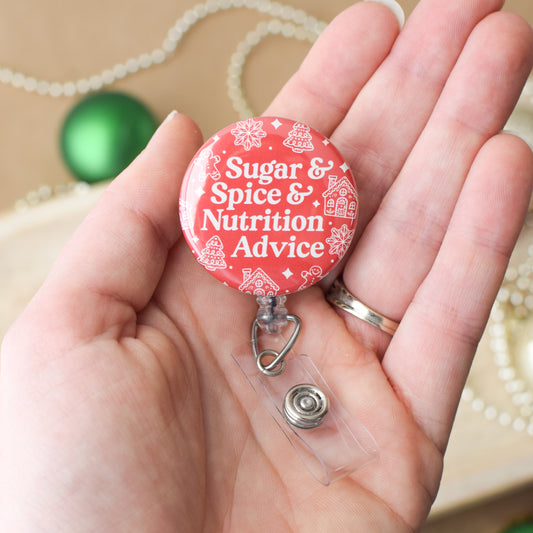 Red badge reel with 'Sugar & Spice & Nutrition Advice' text held in a hand.