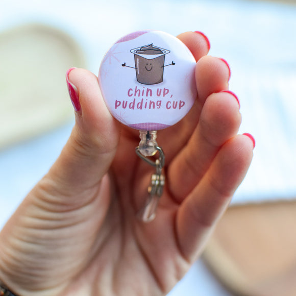 Chin Up, Pudding Cup Badge Reel + Topper